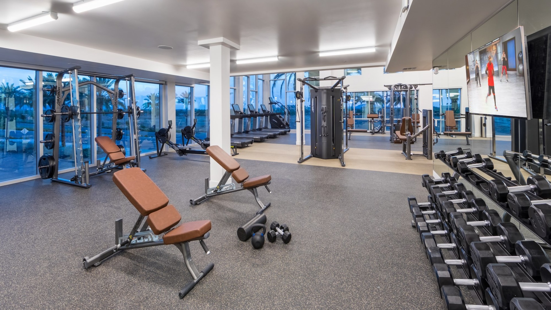 Large fitness center with large windows