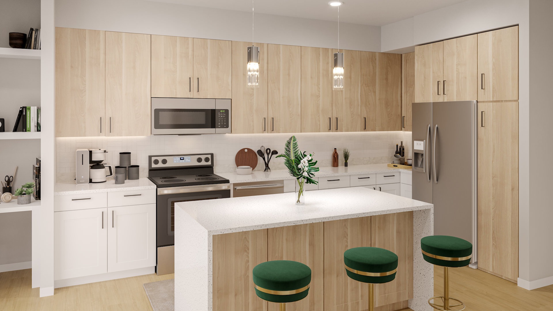 Model kitchen at our apartments for rent in Phoenix, AZ, featuring stainless steel appliances and a kitchen island.
